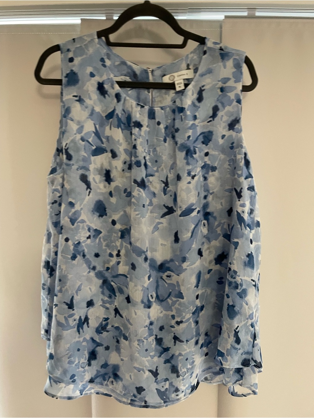 Light Blue Floral Sleeveless Blouse with Pleated Neckline